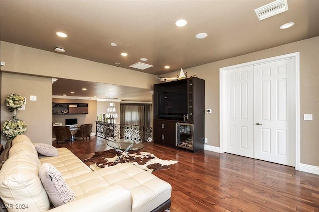 living room with dark hardwood / wood-style floors