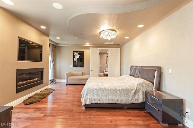 bedroom featuring hardwood / wood-style floors