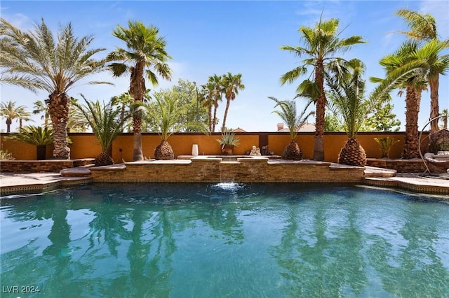 view of pool featuring pool water feature