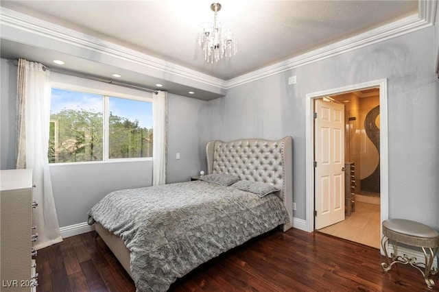 bedroom with dark hardwood / wood-style floors, an inviting chandelier, and crown molding