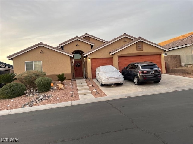 view of front of house with a garage