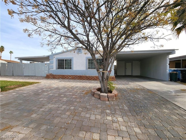 view of front facade featuring a carport