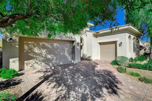 view of front of property with a garage