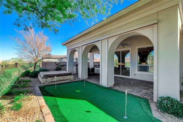 view of patio / terrace featuring ceiling fan