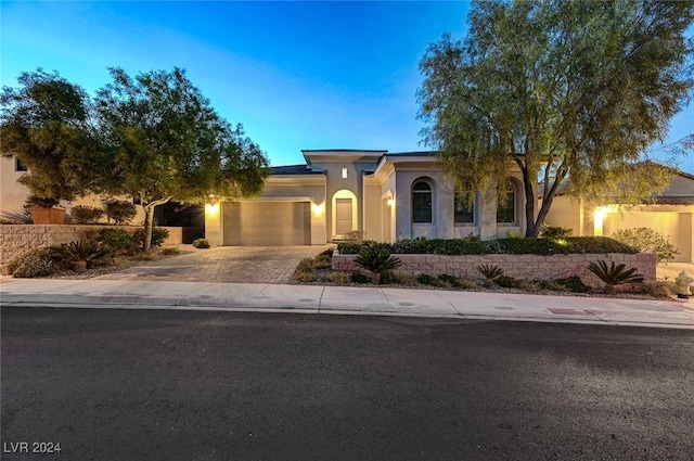 view of front of home with a garage