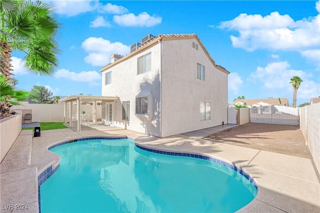 view of swimming pool with a pergola and a patio