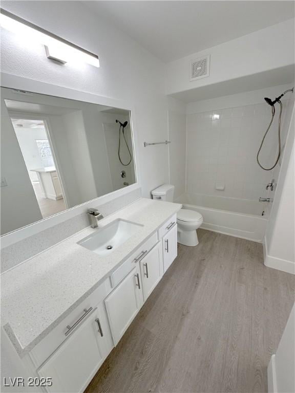 7255 W Sunset Rd Unit 2046, Las Vegas, NV 89113 - bathroom featuring vanity, wood finished floors, and shower / tub combination
