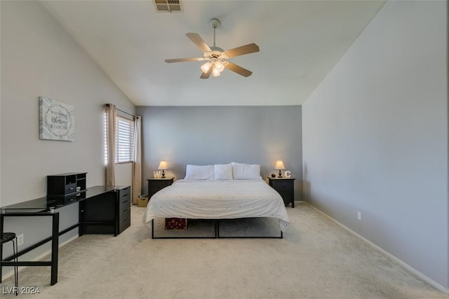 carpeted bedroom featuring ceiling fan and lofted ceiling