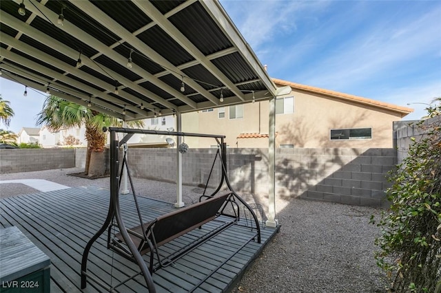 view of patio / terrace featuring a wooden deck