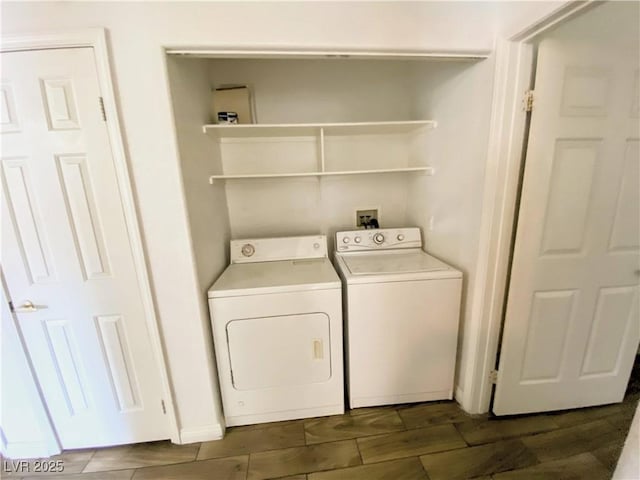 laundry room with washing machine and clothes dryer