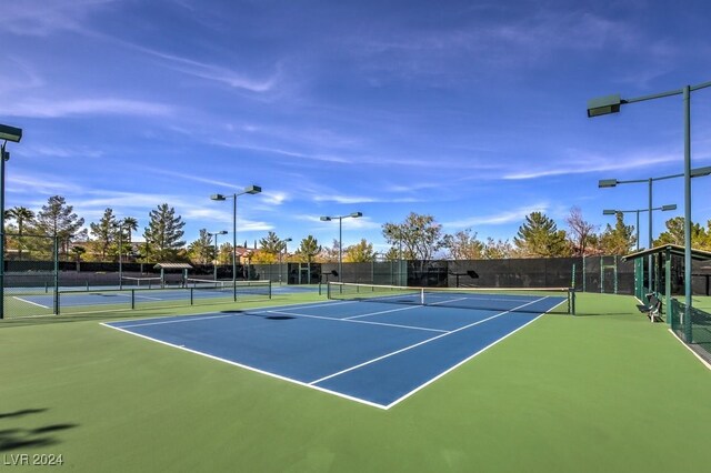 view of tennis court with basketball court