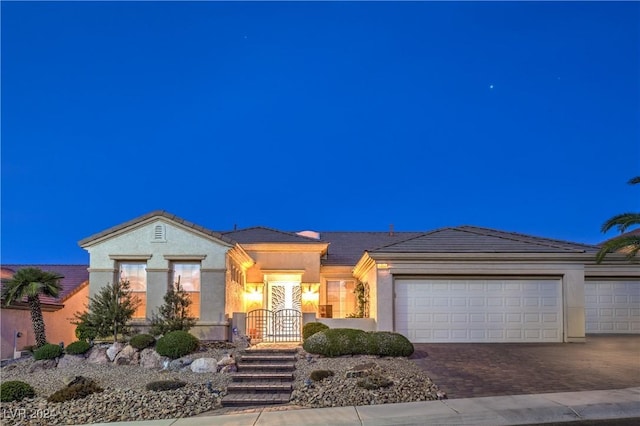 view of front of property with a garage