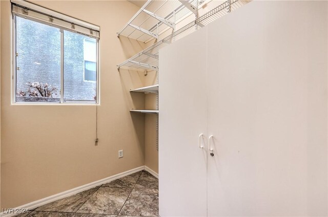 laundry room featuring plenty of natural light