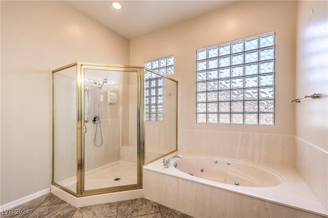 bathroom with independent shower and bath