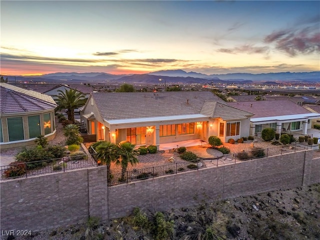 view of front of house featuring a mountain view