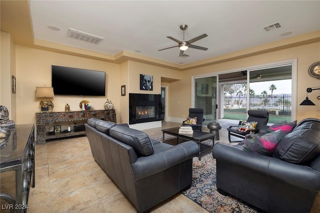 living room featuring ceiling fan