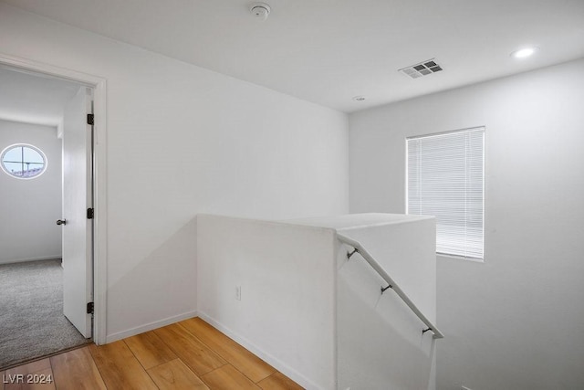 corridor featuring light hardwood / wood-style flooring