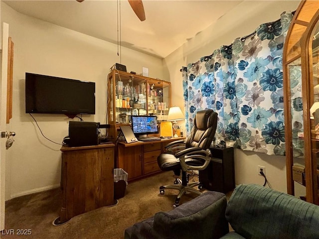 office space featuring ceiling fan and carpet flooring