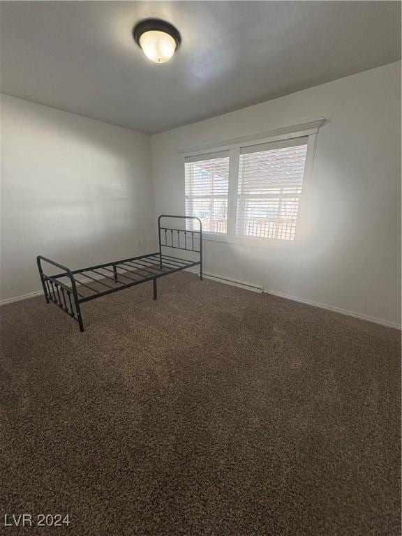 empty room with carpet flooring