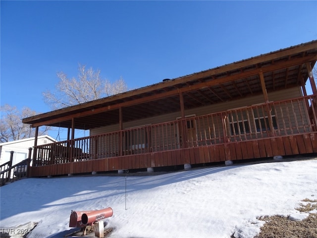 view of snow covered property