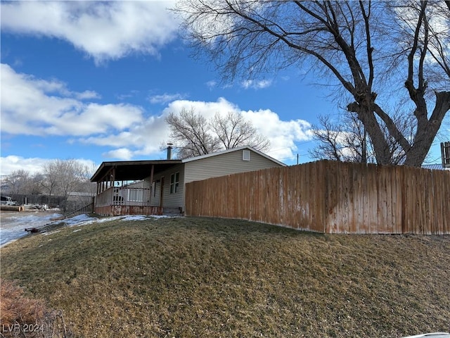 exterior space with a front yard