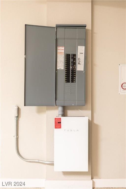 utility room featuring electric panel