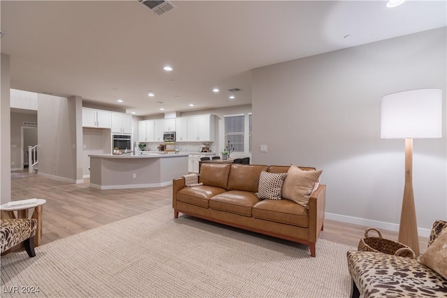 living room featuring light hardwood / wood-style flooring