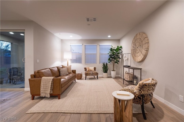 living room with light hardwood / wood-style floors