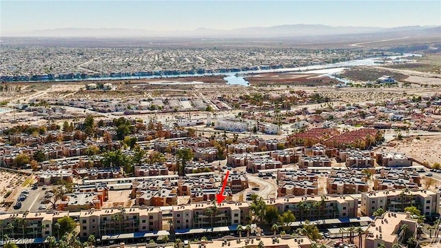 bird's eye view with a water and mountain view