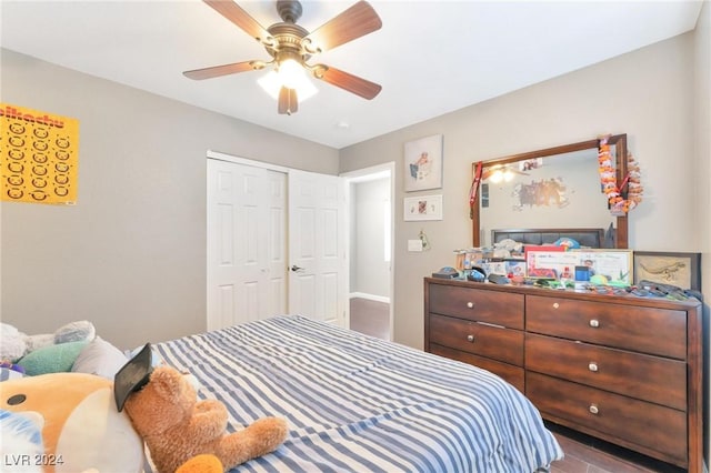 bedroom featuring a closet and ceiling fan