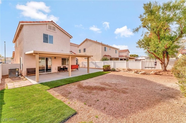 back of property featuring a patio and central AC unit