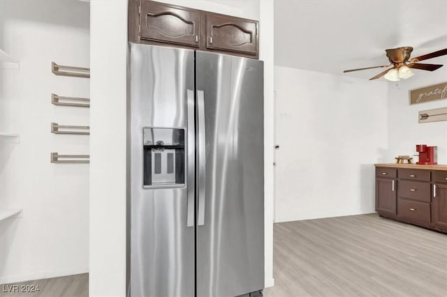 kitchen with stainless steel fridge, light hardwood / wood-style flooring, dark brown cabinets, and ceiling fan