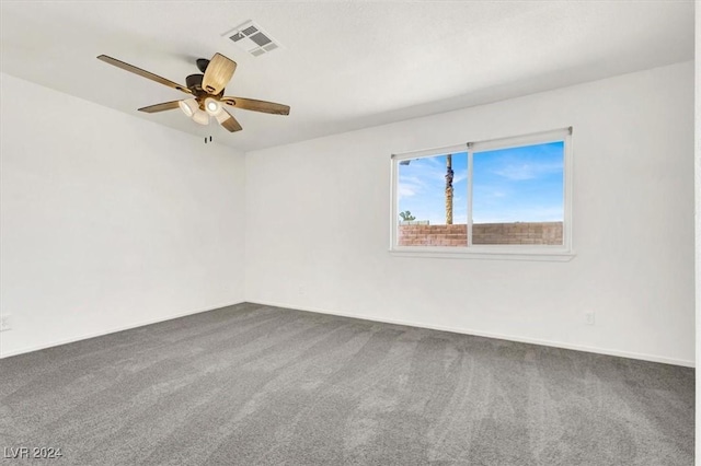 unfurnished room featuring carpet and ceiling fan