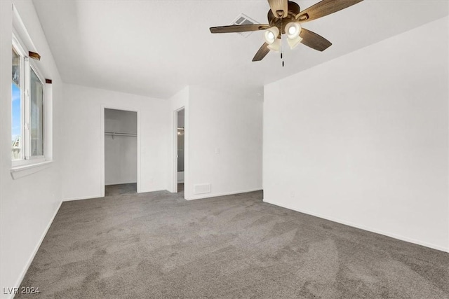 unfurnished bedroom featuring ceiling fan, a closet, and carpet floors