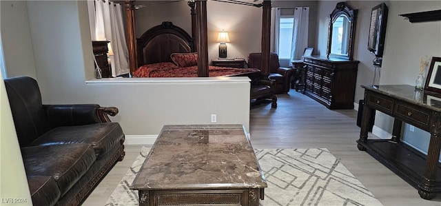 bedroom with light wood-type flooring