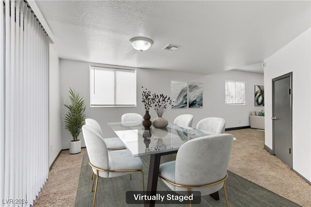 538 Kristin Ln, Henderson, NV 89011 - dining area featuring carpet flooring, baseboards, and a textured ceiling