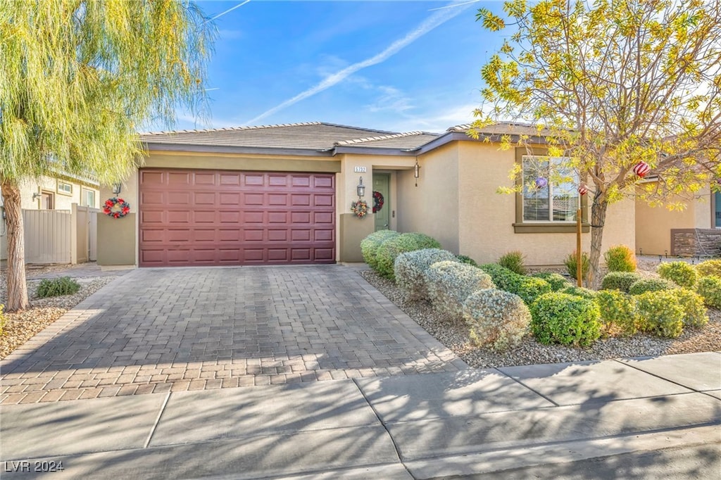 view of front of property featuring a garage