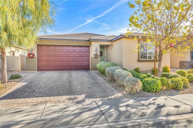 view of front of property featuring a garage