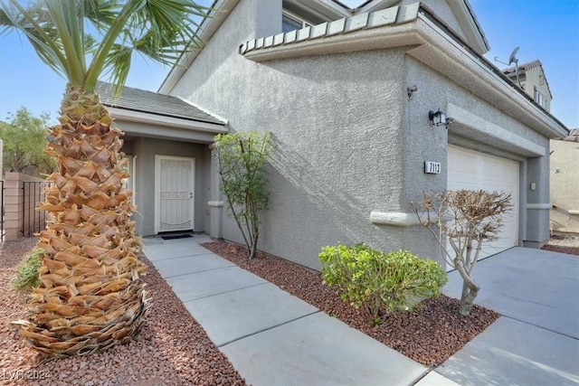 entrance to property with a garage