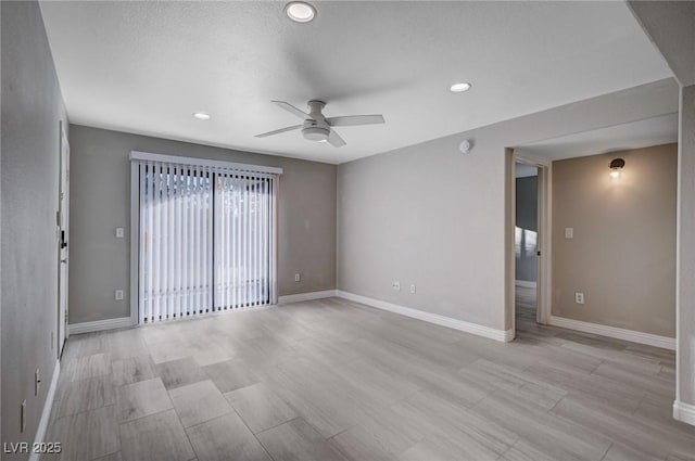 unfurnished room featuring ceiling fan