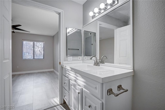 bathroom featuring vanity and ceiling fan