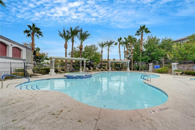 view of pool featuring a community hot tub and a patio