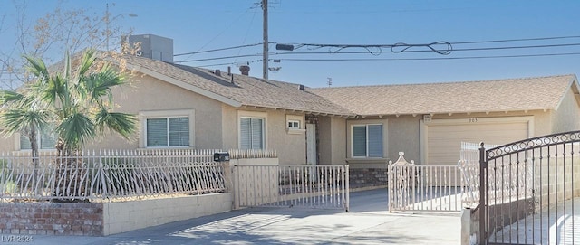 ranch-style home featuring a garage