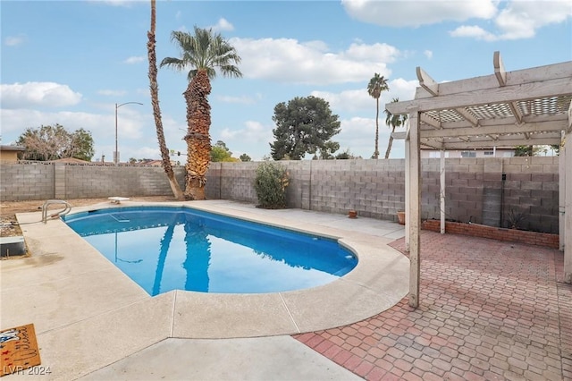 view of pool featuring a pergola and a patio area