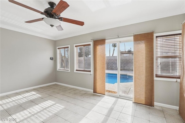 tiled empty room with crown molding and ceiling fan