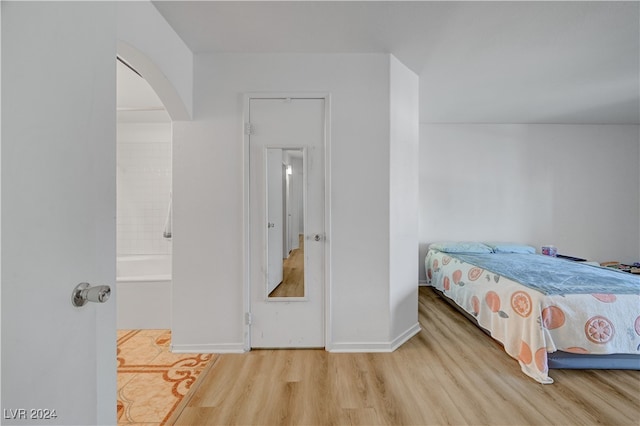 bedroom featuring hardwood / wood-style floors