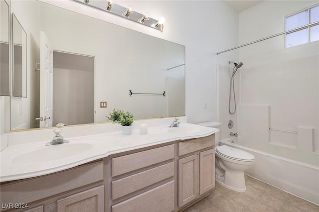 full bathroom with tile patterned floors, vanity, shower / bathing tub combination, and toilet