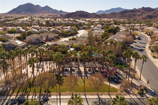 birds eye view of property featuring a mountain view