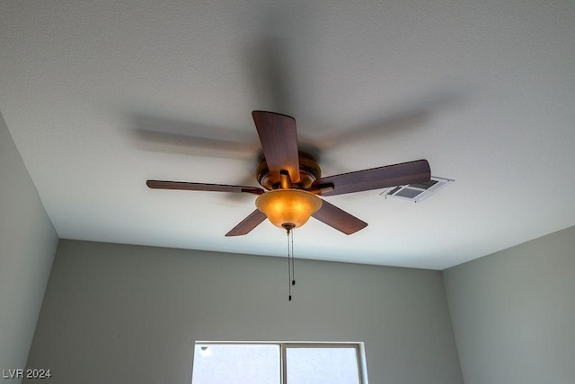 details with visible vents and a ceiling fan