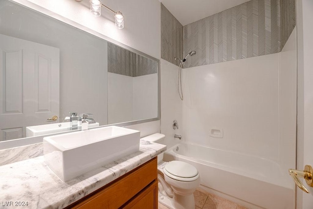 full bathroom with tile patterned floors, toilet, vanity, and bathtub / shower combination